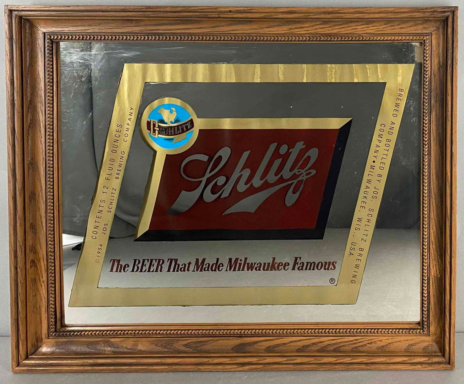 Schlitz Beer Advertising Mirror: 1954, measures 19 X 23 1/4 inches