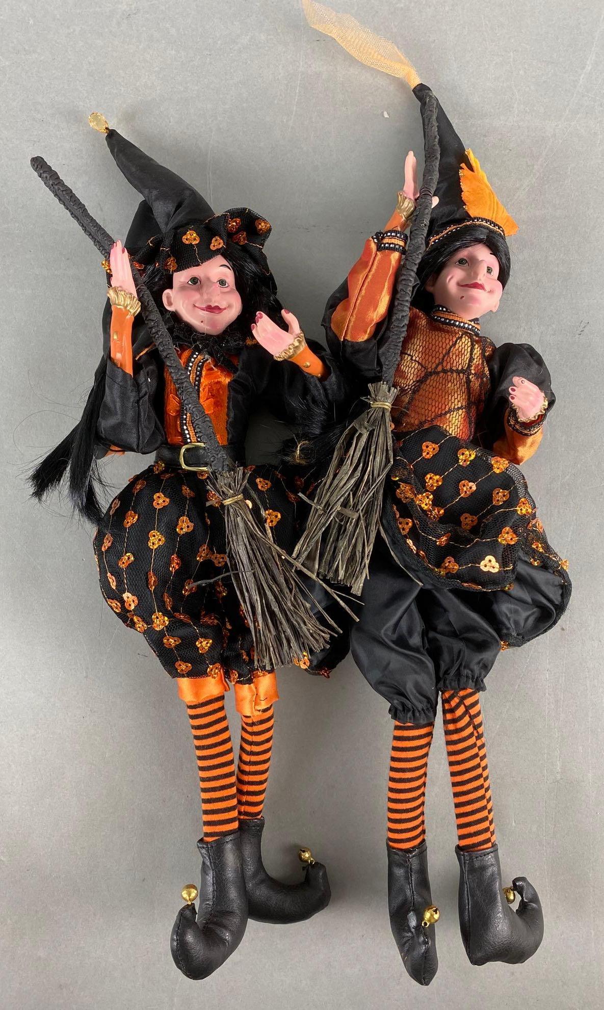 Pair of Halloween Witch Figures: Poseable limbs, largest measures 18 X 5 X 2 1/2 inches