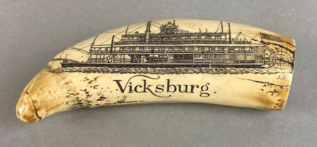 Reproduction Scrimshaw Civil War Confederate Vicksburg Mississippi: Made of Resin, Vicksburg paddle boat on one side, Pistols, Confederate flags, eagle, and 2 swords on other side, Measures 6 3/4 x 2 3/4 x 2in.