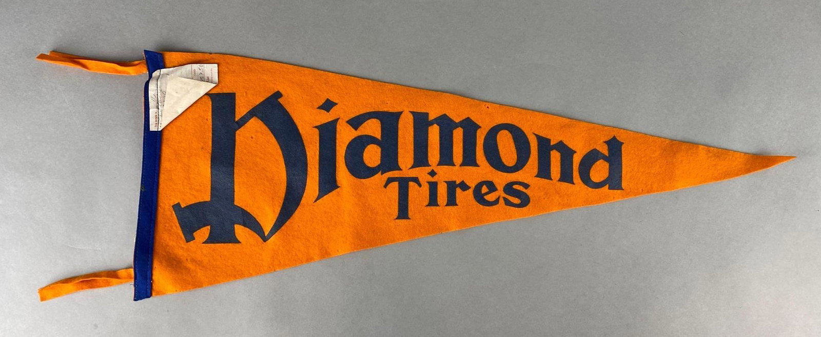 Diamond Tires Felt Advertising Pennant: With original tag, Measures 11 1/2 x 28 1/2 not including tassels.