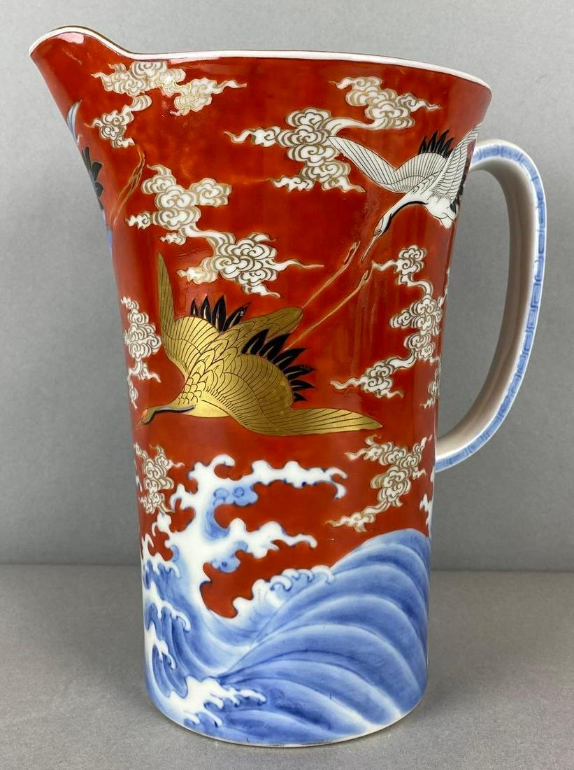 Japanese Porcelain Pitcher with Flying Crane Motif: bottom marked, largest measures 9 1/4 X 8 X 5 3/4 inches