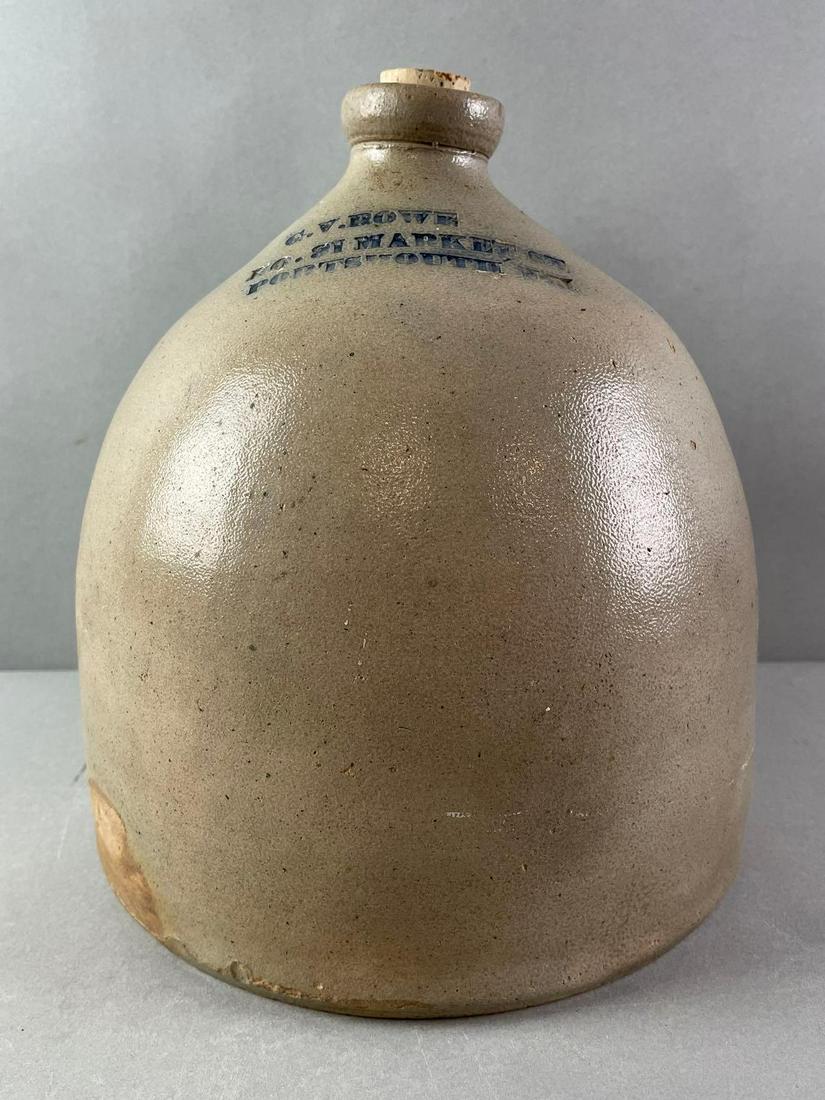 G.V. Rowe Portsmouth, NH 1 Gallon Salt Glaze Jug: debossed cobalt lettering, Portsmouth NH. measures 10 x 8 1/2 inches