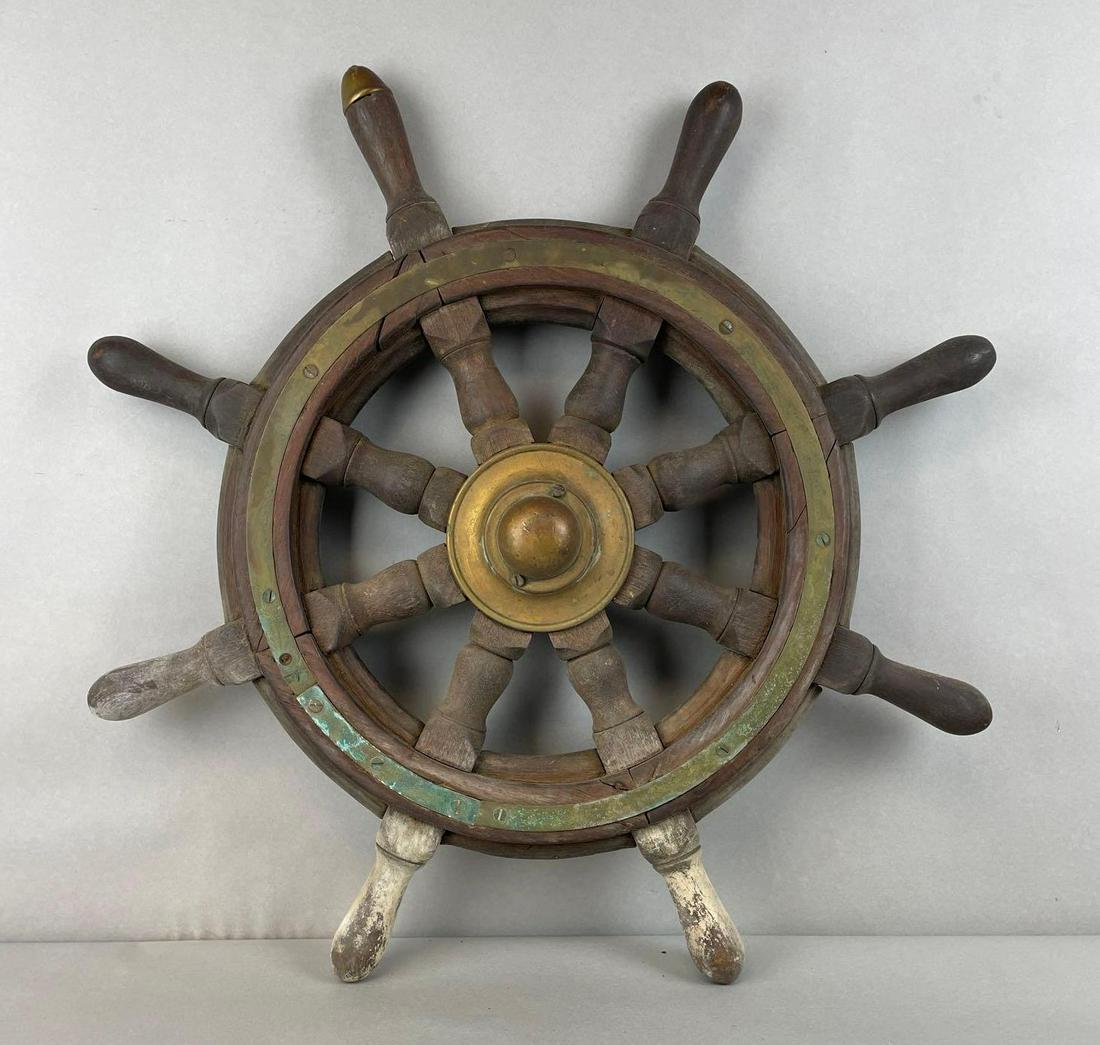 Wood and Brass Small Ship Wheel: Measures 24 1/2 x 3 1/2 inches