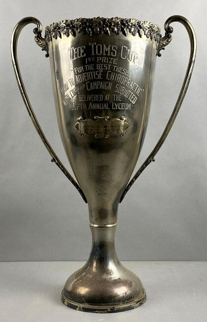 1918 The Palmer School of Chiropractic The Toms Cup 1st Prize Trophy: For the Best Thesis How to Advertise Chiropractic with Copy for Campaign Submitted. Delivered at the Fifth Annual Lyceum. Davenport, Iowa at the P.S.C. Chiropractic Fountain Head.25 x 16 x 5 1/2 inche