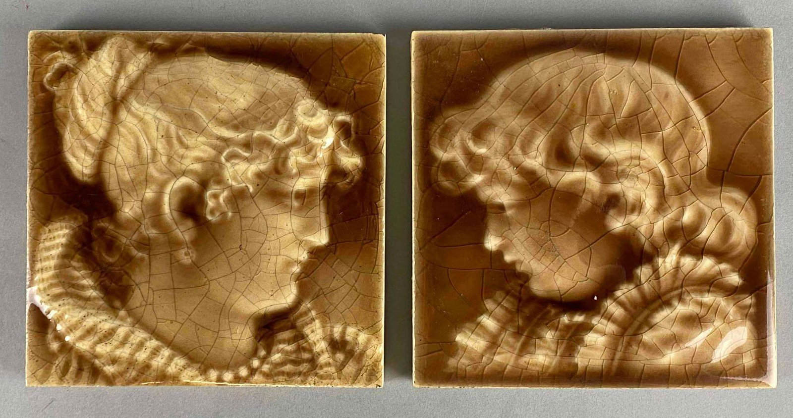 Group of 2 Trent Cameo Tiles: Trenton New Jersey, Crazing across both, Both tiles measure 6 1/4 x 6 1/4in.