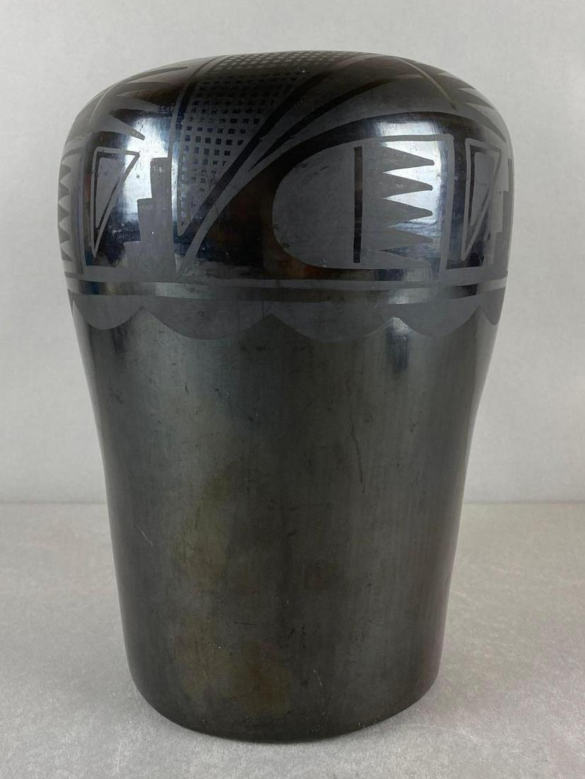 Signed Tonita Roybal San Ildefonso Pueblo Pottery Native American Vase: Grand Daughter of Maria Martinez, bottom signed, measures 10 3/4 X 8 1/4 inches