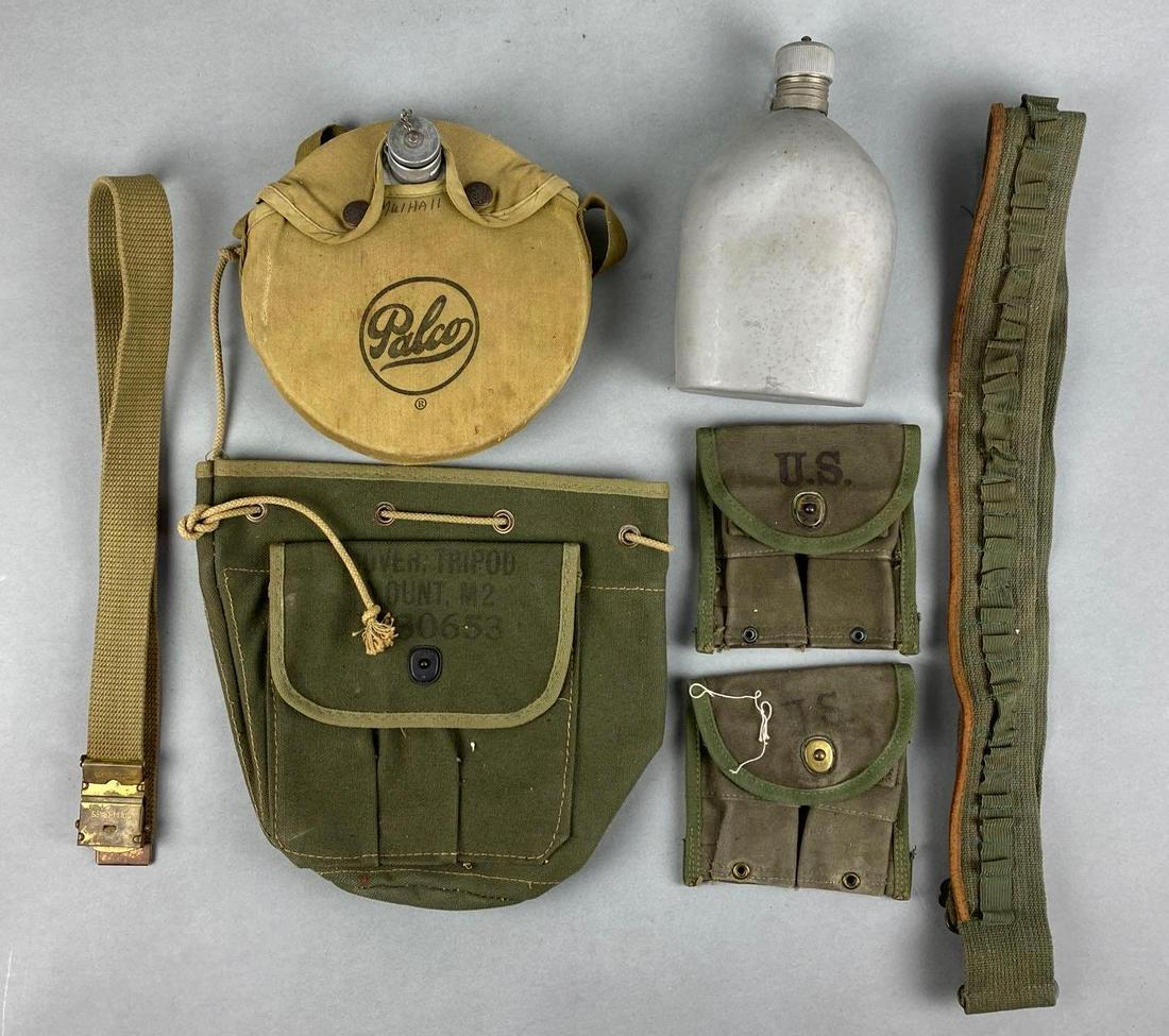 Group of 7 Assorted US Military Pouches and More: Includes water canteen, belts, pouches, and more. Largest pouch measures 10 x 11 inches