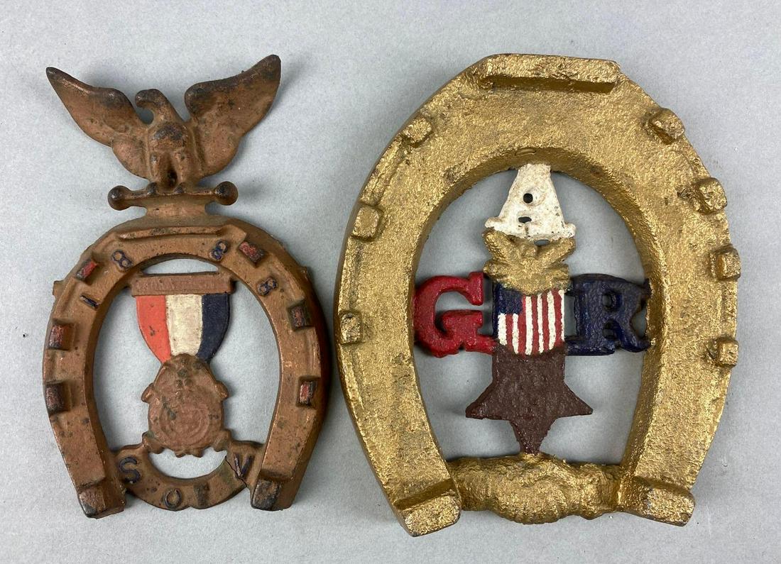 Group of 2 GAR Post Cast Iron Horse Shoe Plaques: One marked GAR, one marked 1888 S of V. Largest measures 6 x 5 1/2 inches
