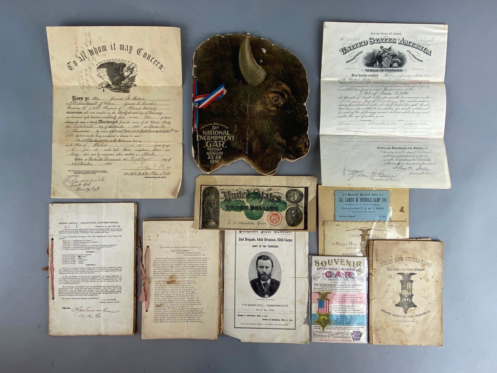 Group of 10 Assorted Post-Civil War Ephemera: 1865-1908, Includes War/military documents, Bureau of Pensions document, Grand Army of the Republic programs, and more, Largest measures 11 1/4 x 8 1/2in.