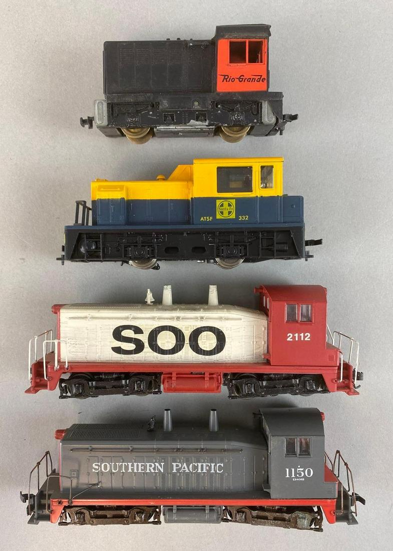 Group of 4 HO Scale Diesel Locomotives: Untested, Includes Rio Grande, ATSF No. 332, SOO No. 2112, and Southern Pacific No. 1150, Longest measures 6 1/2in long.