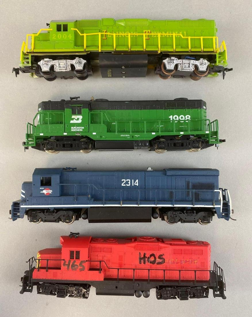 Group of 4 HO Scale Diesel Locomotives: Untested, Includes Life-Like No. 2004, Bachmann No. 2314, Walthers No. 465, and Burlington Northern No. 1998, One with original box, Longest measures 8 1/2in long.