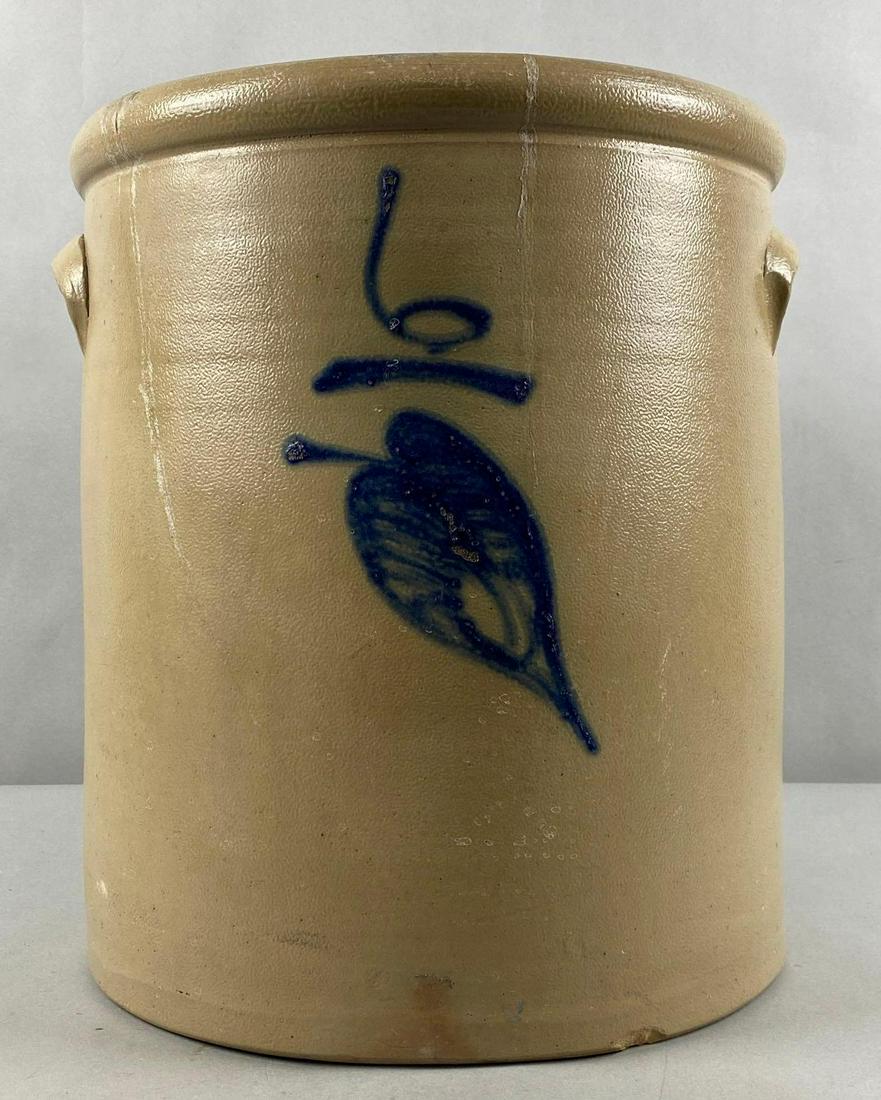 6 Gallon Red Wing Salt Glaze Leaf Stoneware Crock: 6 Gallon cobalt Leaf Red Wing Minnesota with hairline cracks and a few inner rim chips. 14 1/2 x 12 x 12 inches.