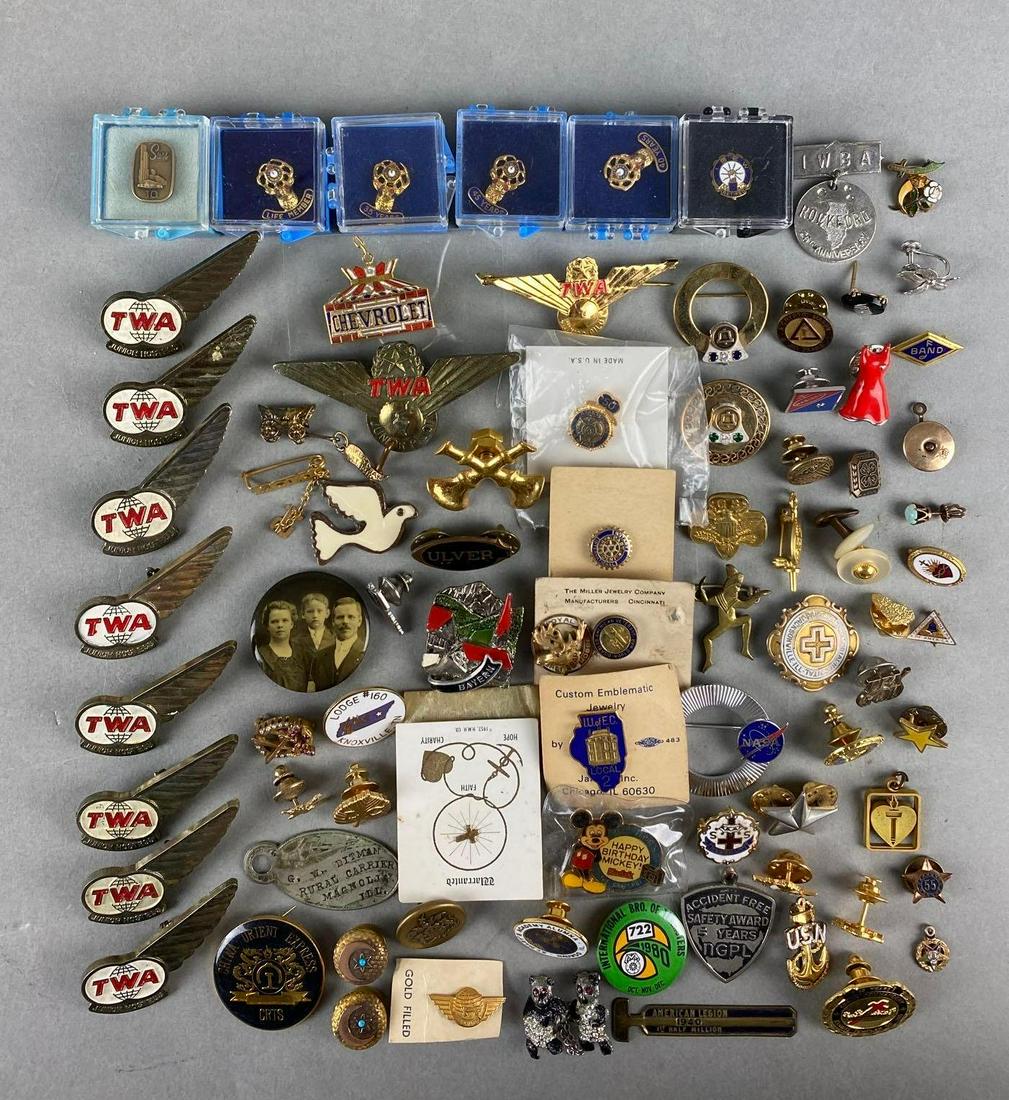 Group of Pins TWA, Happy Birthday Mickey, and More: Includes 4 H, TWA, happy birthday Mickey, and more. Largest measures 2 3/4 X 1 1/2 inches