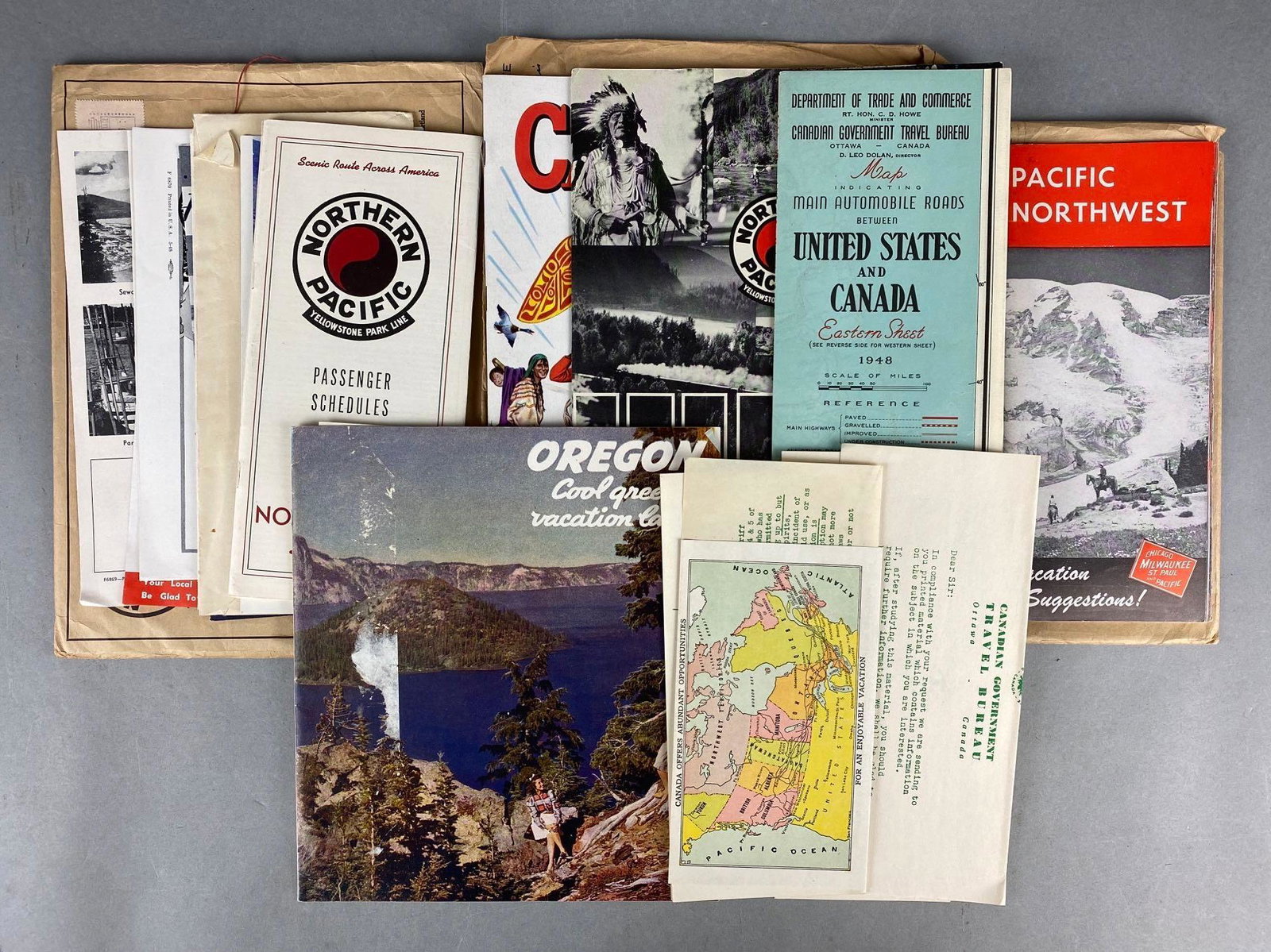 Group of Travel Ephemera: Includes train schedules, maps, scenic magazines, and more