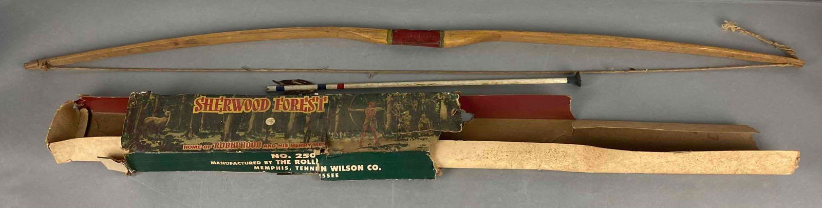 Sherwood Forest Bow and Arrow: With original box - torn and discolored, measures 45 1/2 X 3 inches