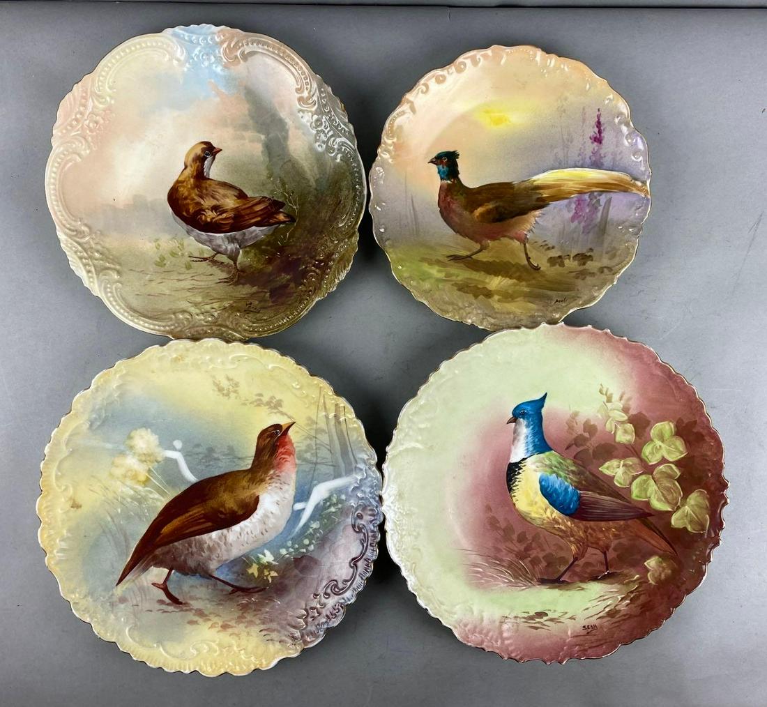 Group of 4 Limoges France Porcelain Bird Plates: Largest measures 13 1/2 inches in diameter. Includes BH Limoges France and Limoges LOBC France.
