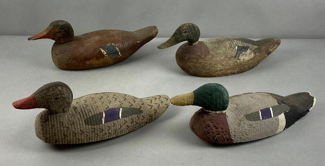 Group of 4 Wood Duck Decoys: Largest measures 7 x 15 1/2 x 5 inches. Some head detach.