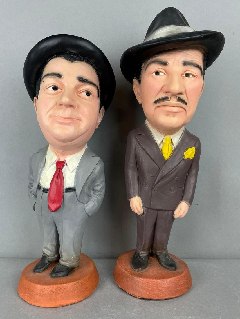 Group of 2 Abbott and Costello Esco Chalkware Statues: Larger measures 18 1/2 x 7 x 7 3/4 inches