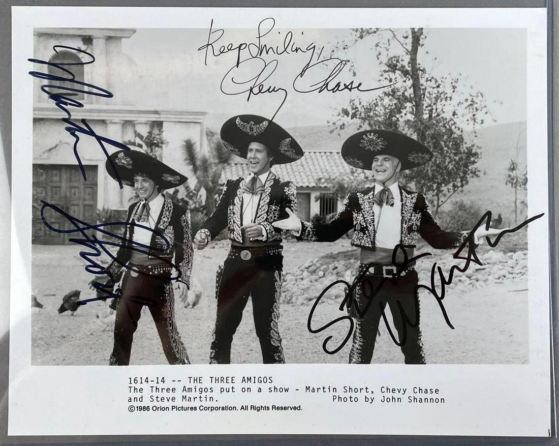 Three Amigos Cast Signed Photograph No COA: Includes Martin Short, Chevy Chase, and Steve Martin signatures. Measures 8 x 10 inches, no COA, unknown authenticity, buying as is.