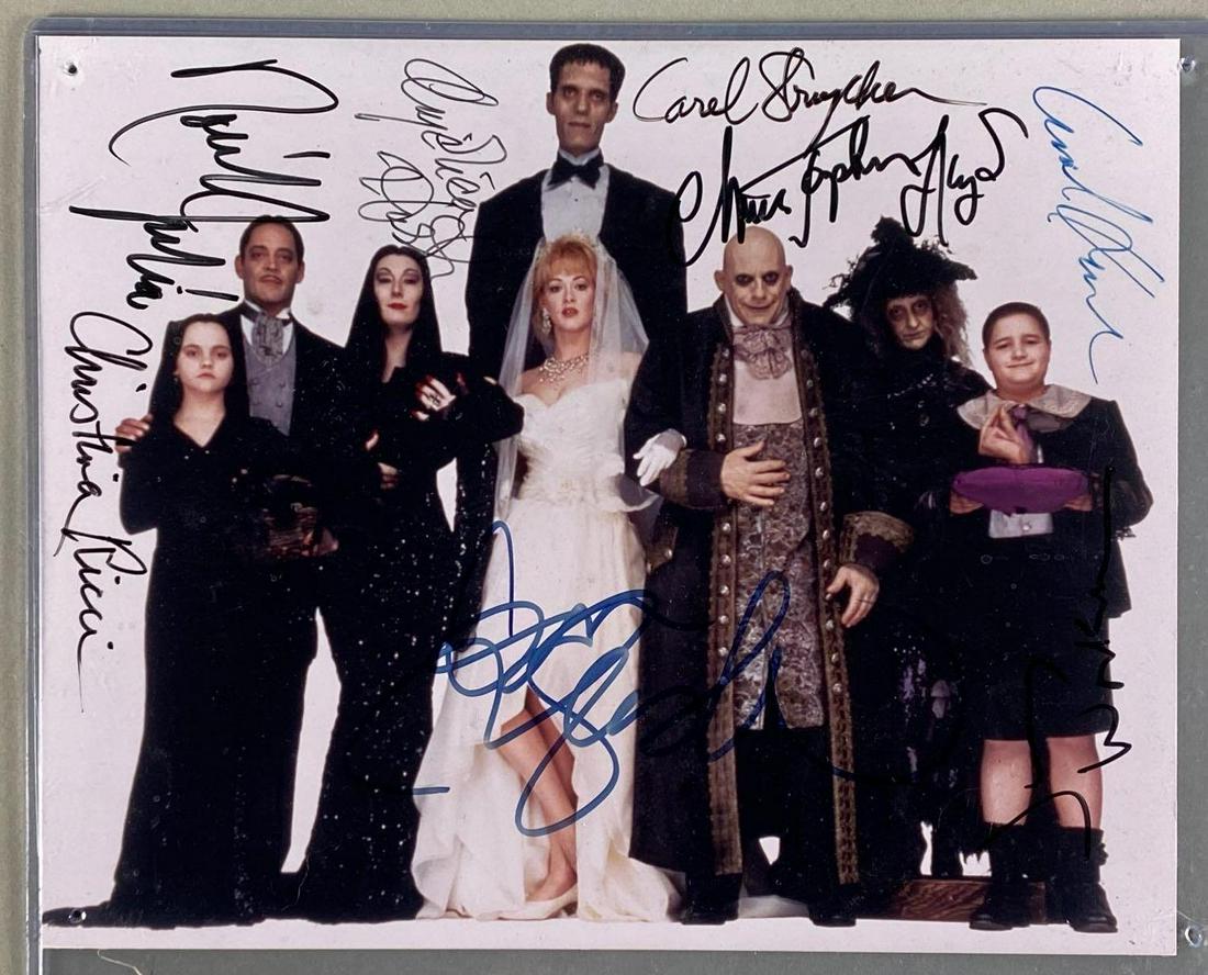 Addams Family Signed Cast Photograph No COA: Signatures from all pictured, Signatures include Anjelica Huston, Christina Rocco, Raul Julia, Christopher Lloyd, and more, Pinholes on corners, Measures 8 x 10in, No COA, Unknown Authenticity, Buying