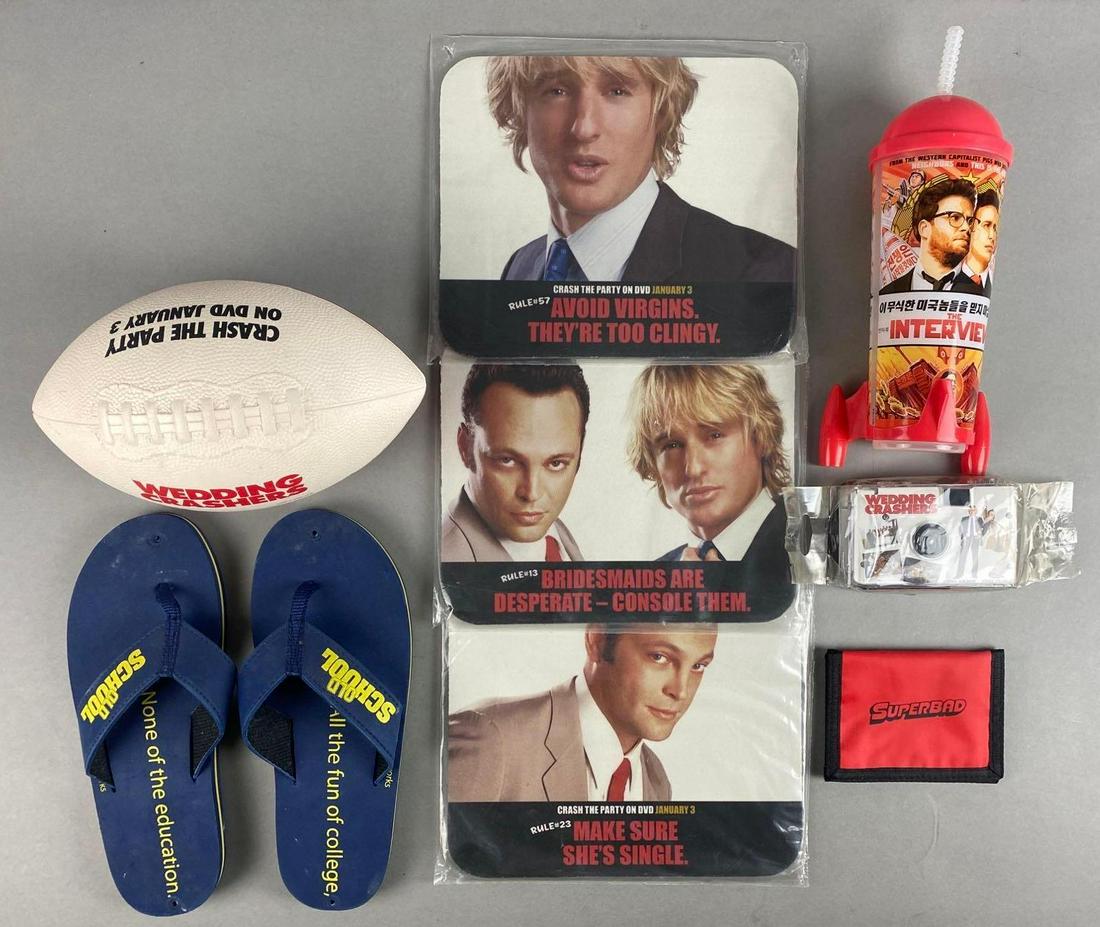 Group of 8 Assorted Comedy Movie Cinema Promotional Items: Includes Superbad Wallet, The Interview Cup, Wedding Crashers Camera, and more. Sandals are a ladies size 6-8.