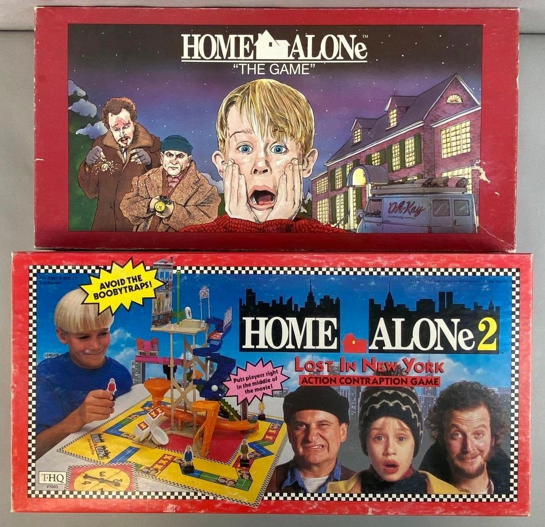Group of 2 Home Alone Board Games: Includes Home Alone the Game, and Home Alone 2 action Contraption Game, Unknown set completions, Holes in corners of board from hanging, Some warps/tears in Home Alone board, Largest box measures 10 1