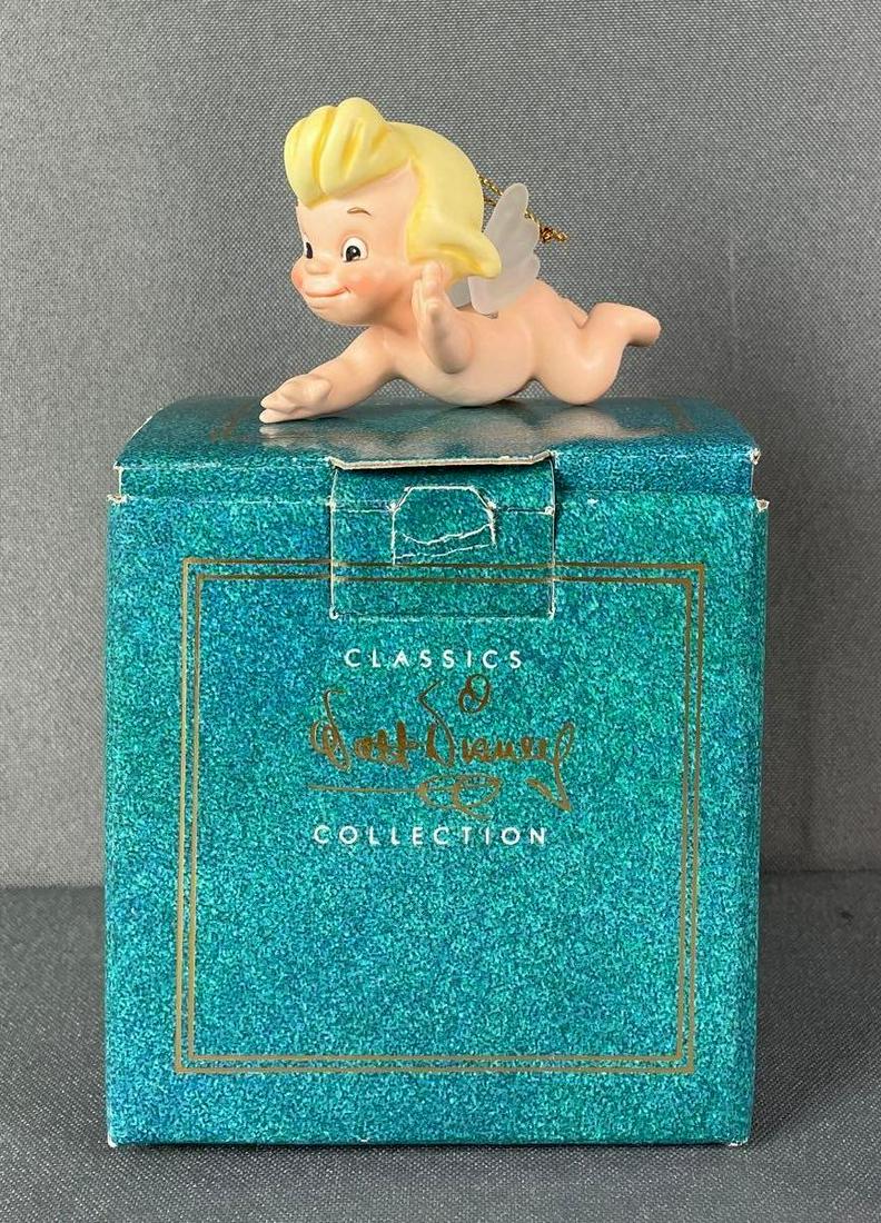 Disney Classics Collection Flight of Fancy Ornament: Fantasia. certificate of authenticity and original packaging. measures 1 1/2 x 1 1/2 x 3 inches
