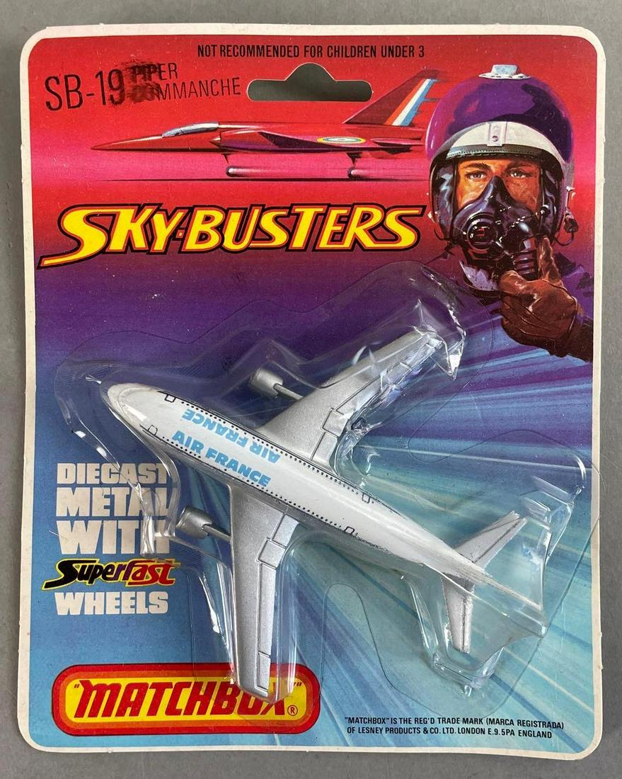 Group of 8 Matchbox Sky-Busters SB-19s: Shipping sleeve of 8 Air France Piper Commanches. Original packaging measures 6 3/4 x 5 1/2 inches