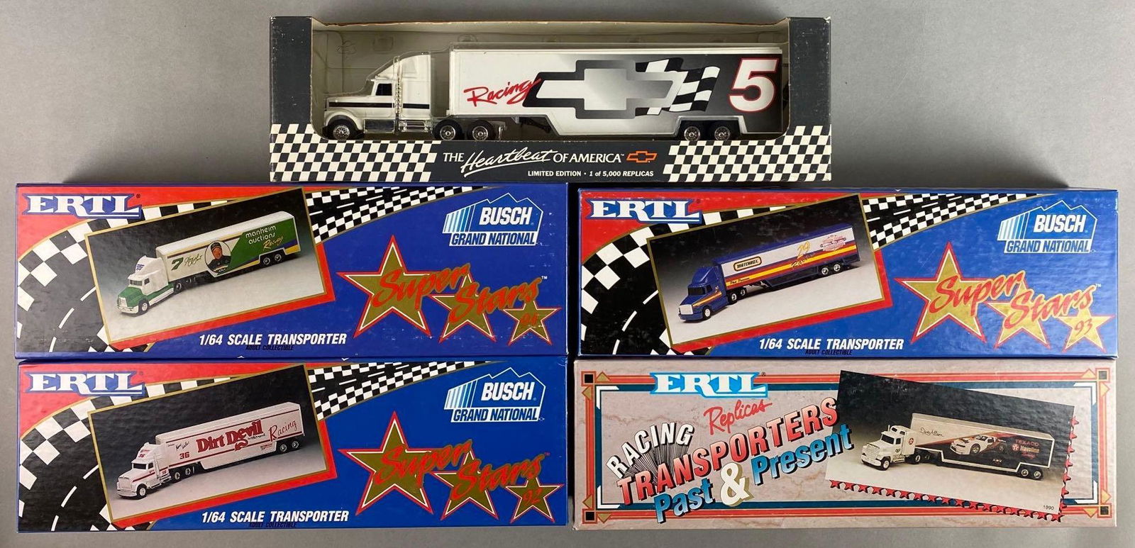 Group of 5 Die-Cast Transporter Trucks: 1:64 scale, with original boxes, includes Dirt Devil, Texaco, Matchbox and more