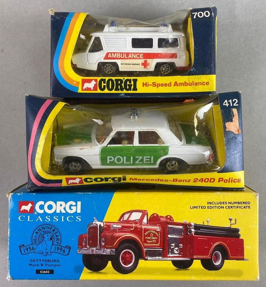 Group of 3 Corgi Die-Cast Vehicles: Includes Mercedes-Benz 240D Police, Hi-Speed Ambulance, and Mack B Pumper. With original boxes, largest measures 7 X 2 1/4 X 2 1/2 inches