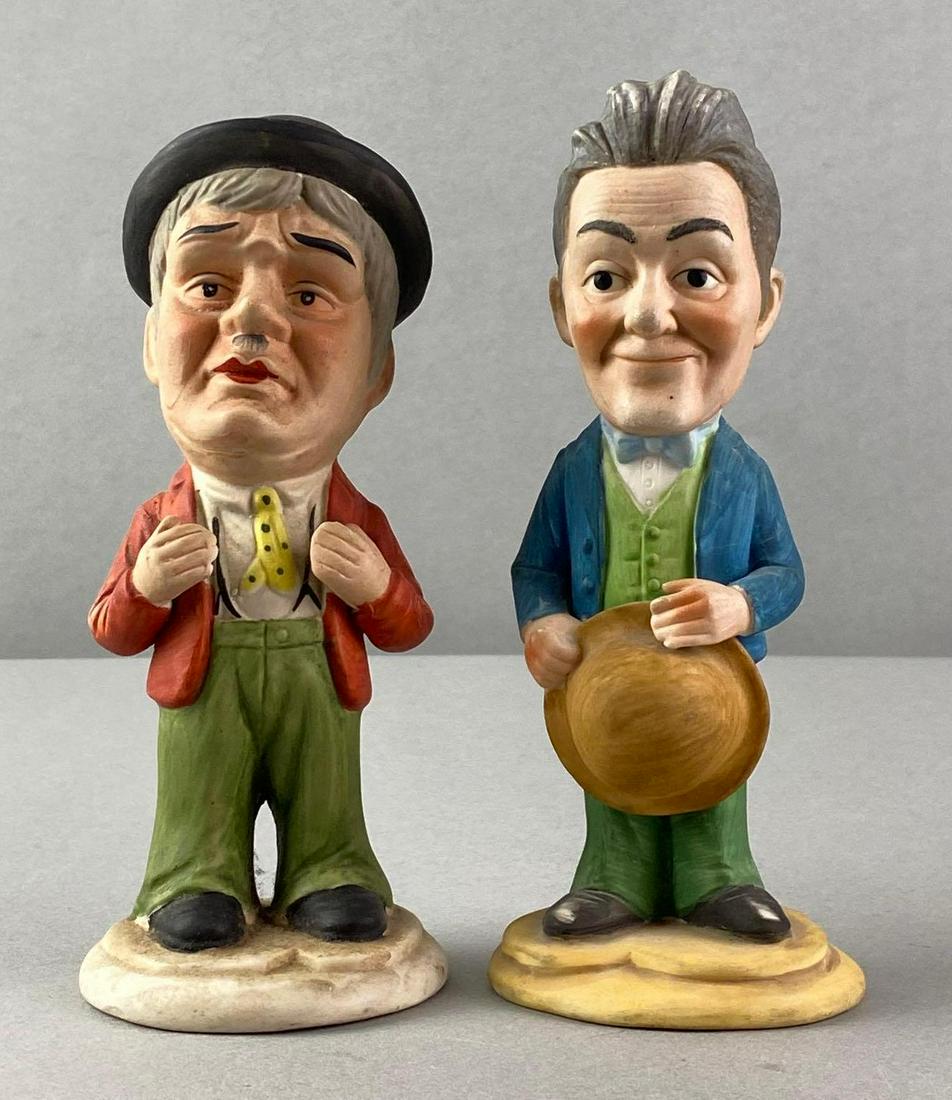 Group of 2 Laurel and Hardy Porcelain Figures: Largest measures 7 1/2 x 2 inches. One marked Royal Crown 441/7297
