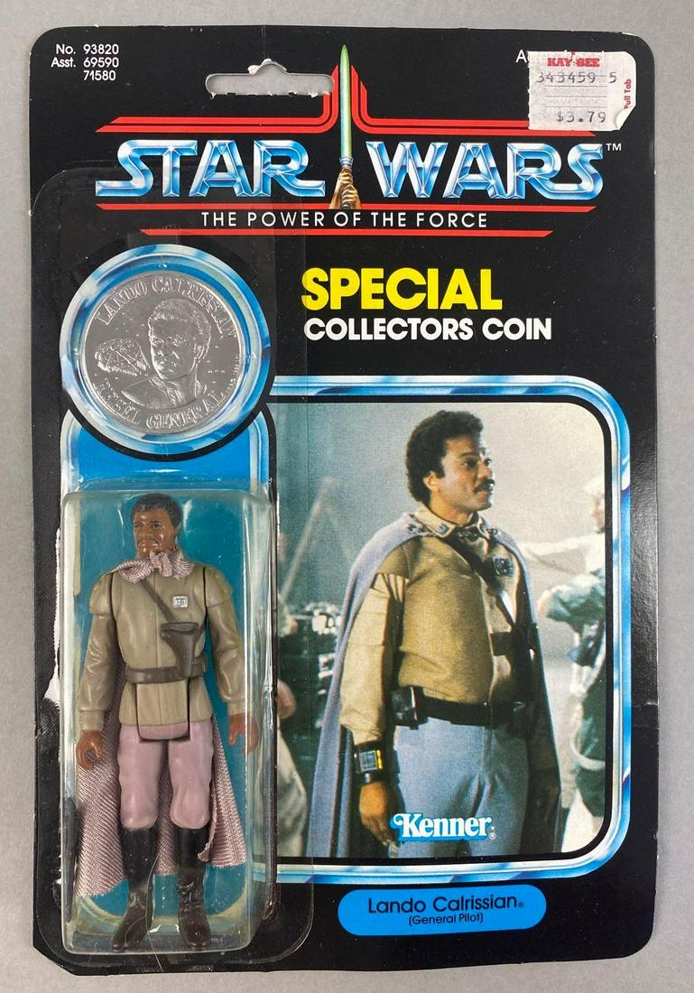Kenner Star Wars The Power of the Force Lando Calrissian Action Figure: 1984, punched. Blister is dented. Packaging measures 9 x 6 inches.