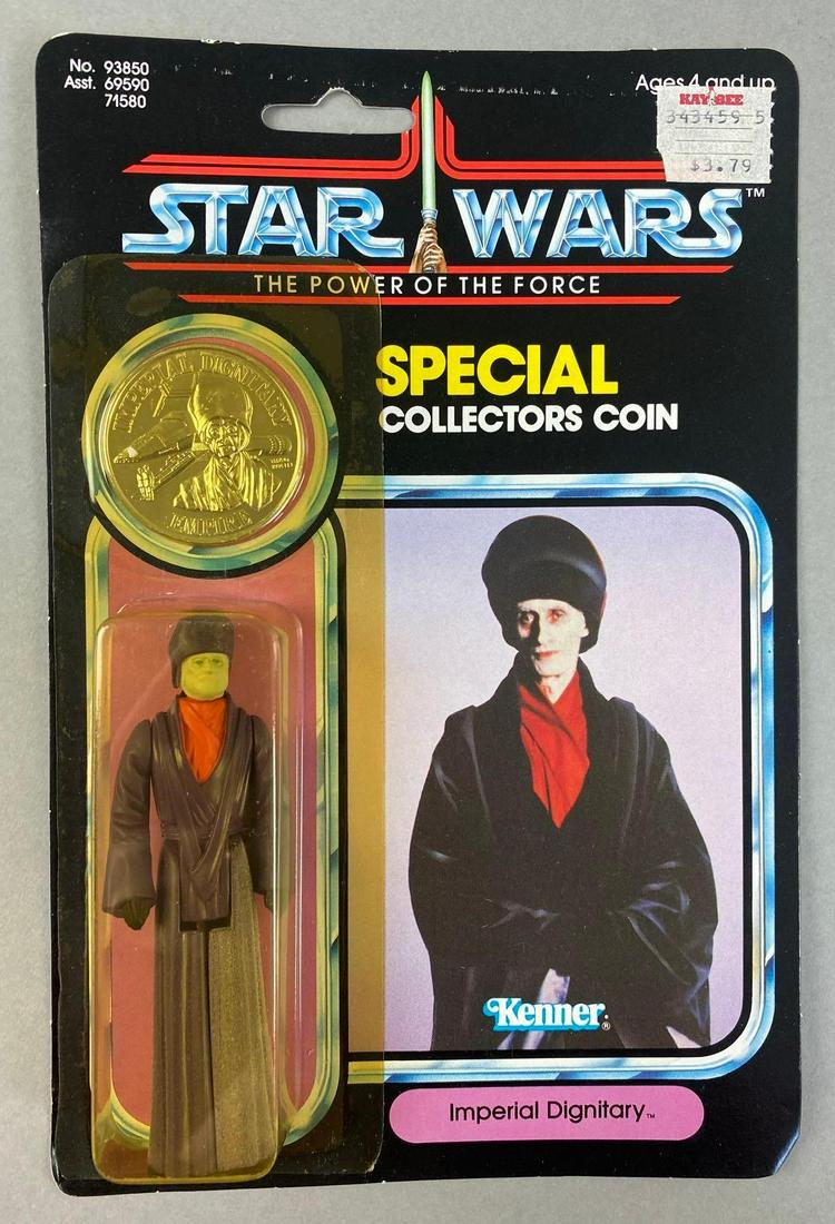 Kenner Star Wars The Power of The Force Imperial Dignitary Action Figure: 1984, blister has sun damage. Special collectors coin. Packaging measures 9 x 6 inches.