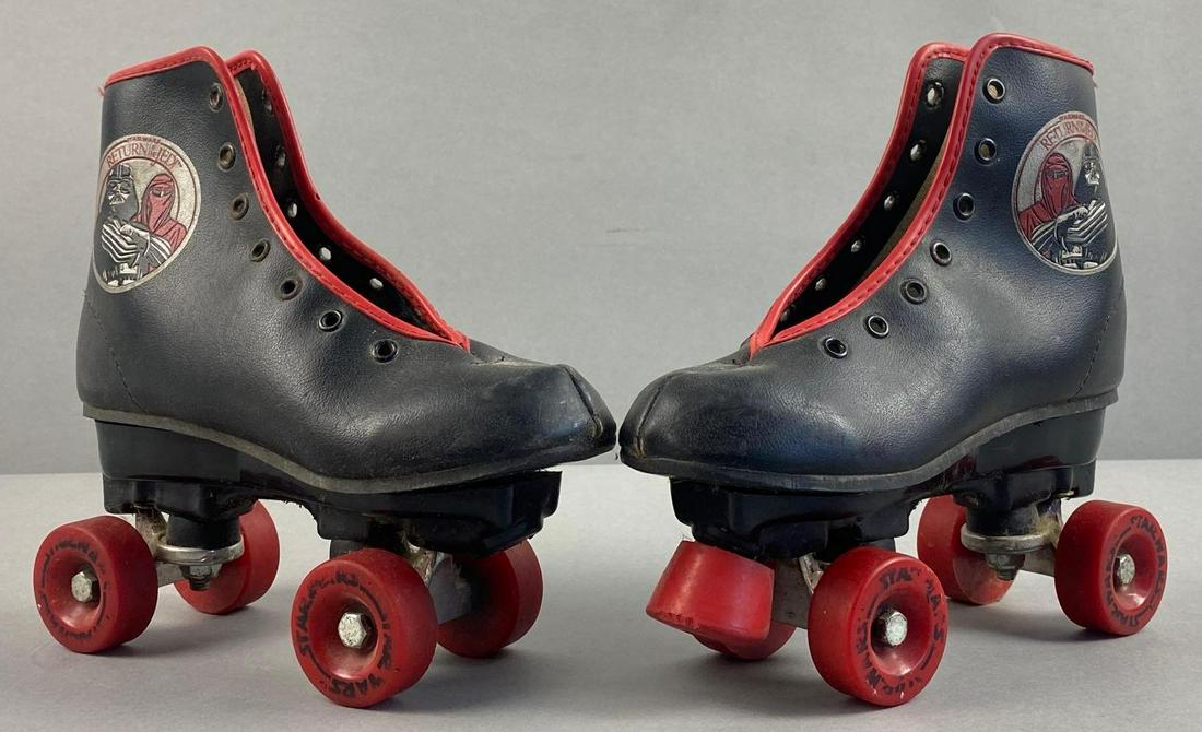 Pair of Star Wars Return of the Jedi Childrens Roller Skates: 8 inches long. One is missing stopper.