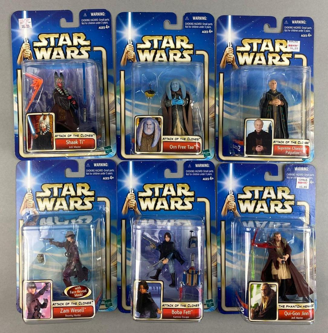 Group of 6 Hasbro Star Wars Action Figures: Includes Boba Fett, Qui-Gon Jinn, Shaak Ti, and more. Packaging measures 9 x 6 inches