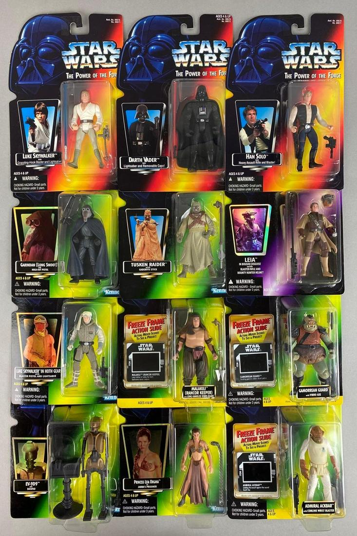 Group of 12 Kenner Star Wars Power of the Force Action Figures: Includes Darth Vader, Han Solo, and more. 1995 and 1997, 4 inch figures, all in original packaging, measures 9 X 6 X 1 1/2 inches, with shipping box, box measures 7 X 9 1/2 X 11 1/2 inches