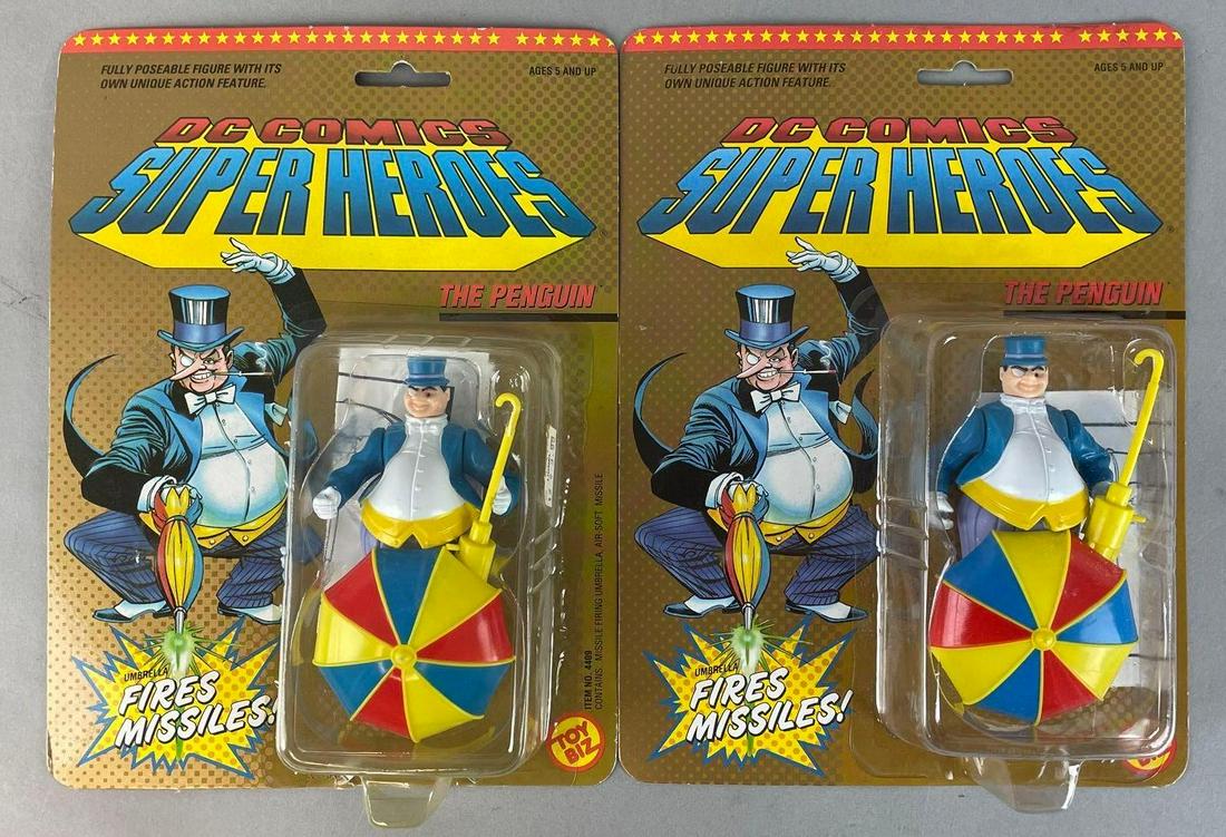 Group of 2 Toy Biz DC Comics The Penguin Action Figures: 1989 original packaging. Each measure 10 x 7 1/2 inches