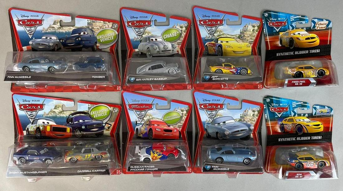 Group of 8 Disney Pixar Cars Diecast Vehicles: 2009-2012 original packaging. Includes Finn mcmissile, sir Harley gassup, Darrell cartrip, and more. Largest measures 6 1/2 x 8 1/2 inches