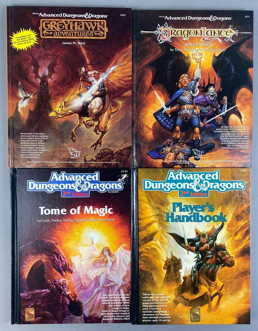 Group of 4 Advanced Dungeons and Dragons Books: Includes Greyhawk Adventures, Dragon Lance, 2nd Edition Players Handbook, and 2nd Edition Tome of Magic. 11 x 9 inches