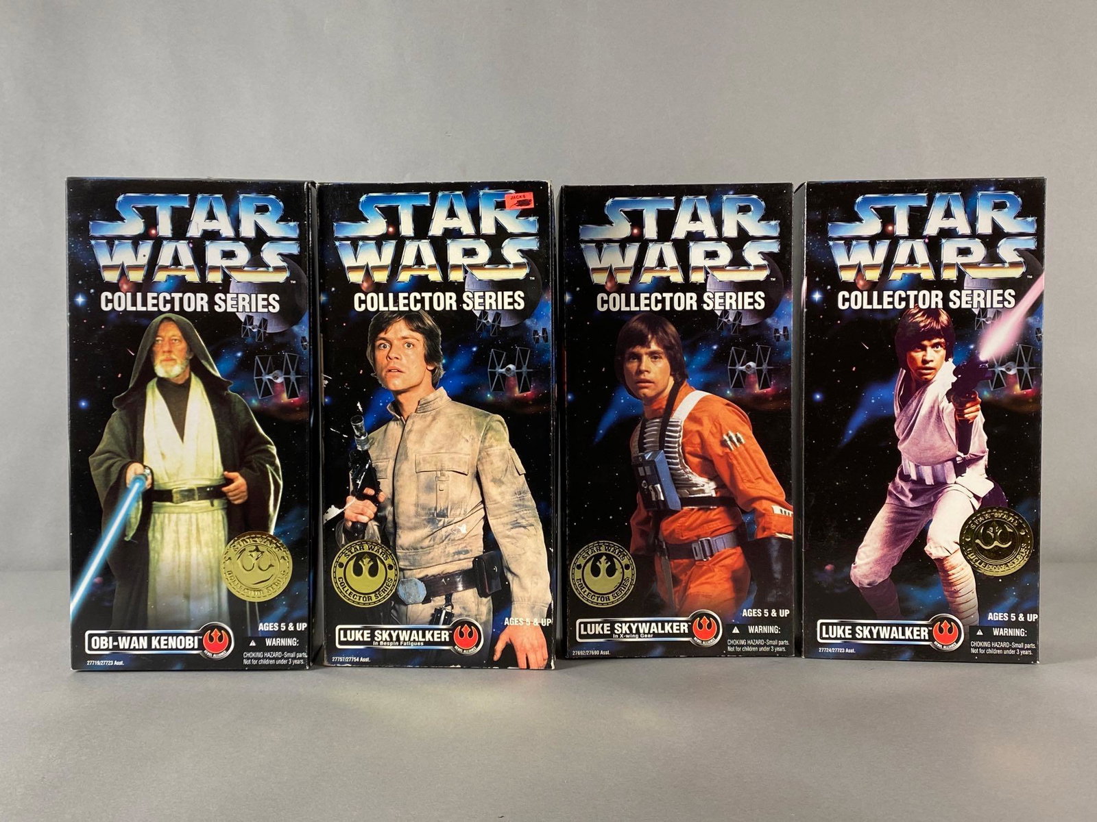Group of 4 Kenner Star Wars Action Figures: 1996, In original packaging, Includes Obi-Wan Kenobi, Luke Skywalker, Luke in Bespin Fatigues, and Luke in X-Wing Gear, Some tape and tears on boxes, Boxes measure 13 x 6 1/2 x 2 1/2in, Figures measur