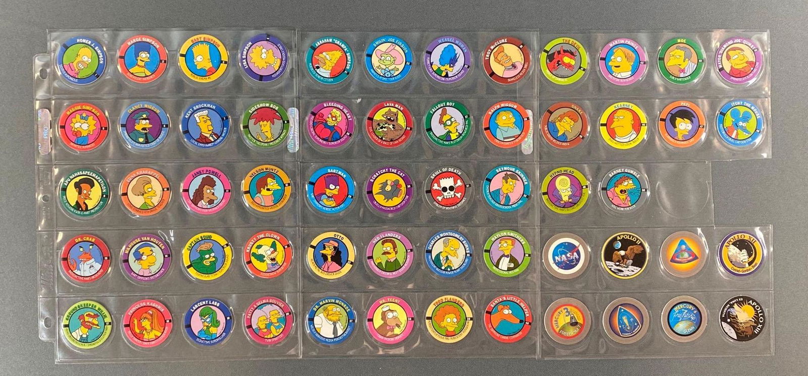 1994 SkyCaps Simpsons Pogs and More: Includes No. 1-50 Simpsons Pogs. Includes 8 assorted space Pogs. In protective sheets.