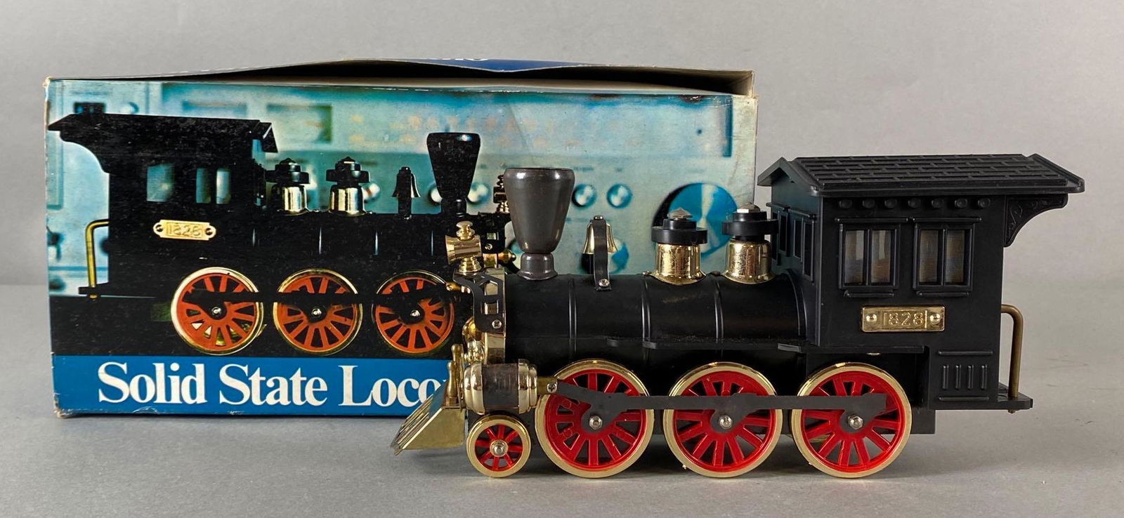Solid State 1828 Locomotive Radio: With original box, Untested, Box adhesive not intact, Box measures 5 1/4 x 11 x 4in.