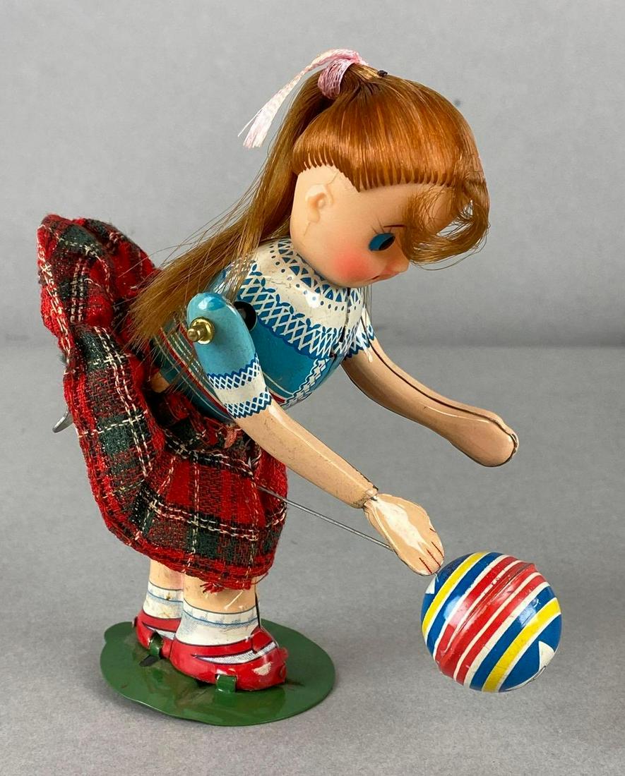 T.P.S. Tin Litho Wind Up Suzy Bouncing Ball (1 of 5)