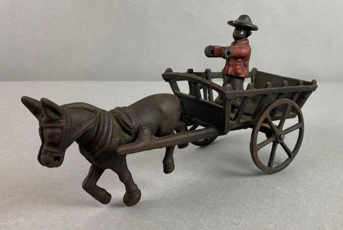 Antique Black Americana Cast Iron Mule and Stake Cart with Driver: Unmarked, paint loss, measures 9 3/4 X 3 3/4 X 5 inches