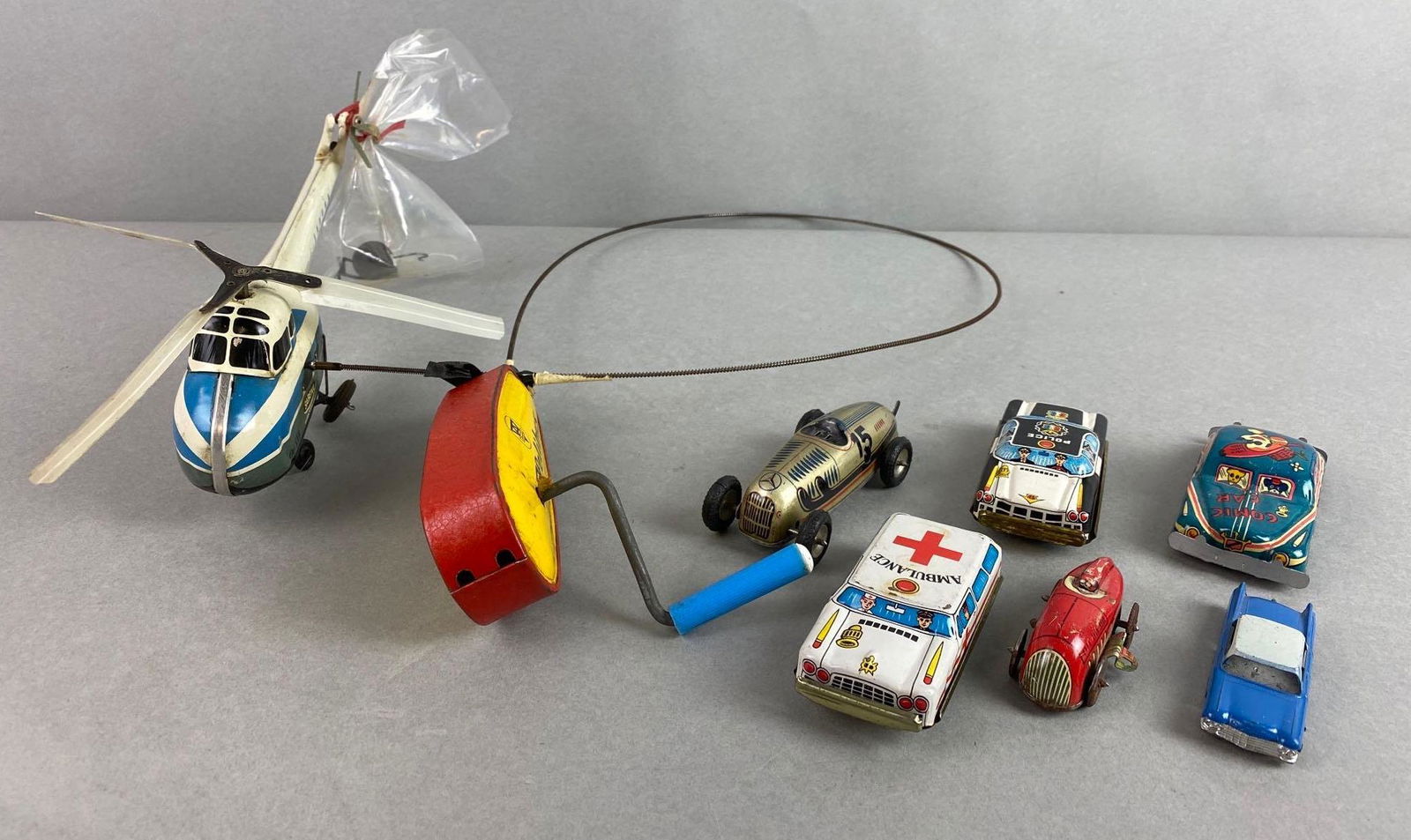 Group of 7 Tin Lithograph Vehicles (1 of 4)