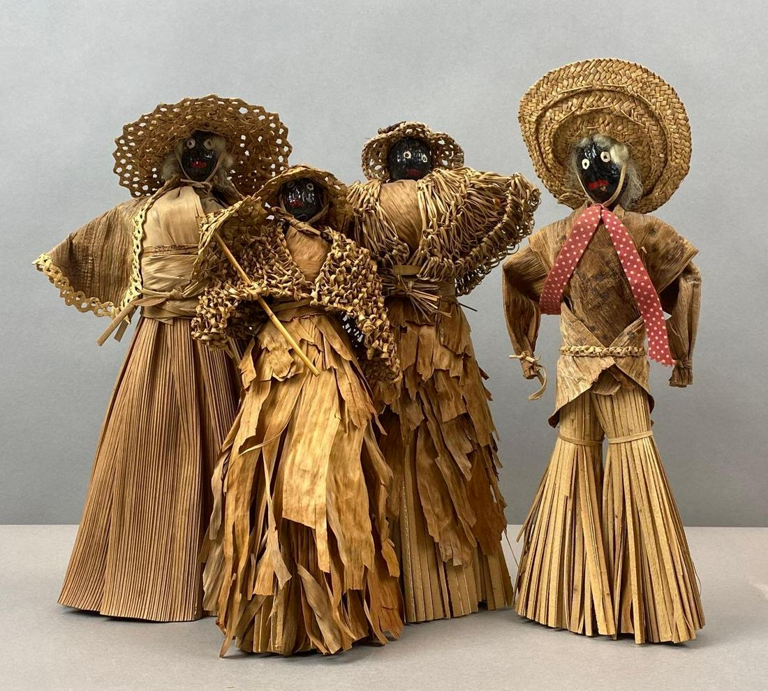 Group of 4 Black Straw Figures: Largest measures 13 1/2 inches tall.