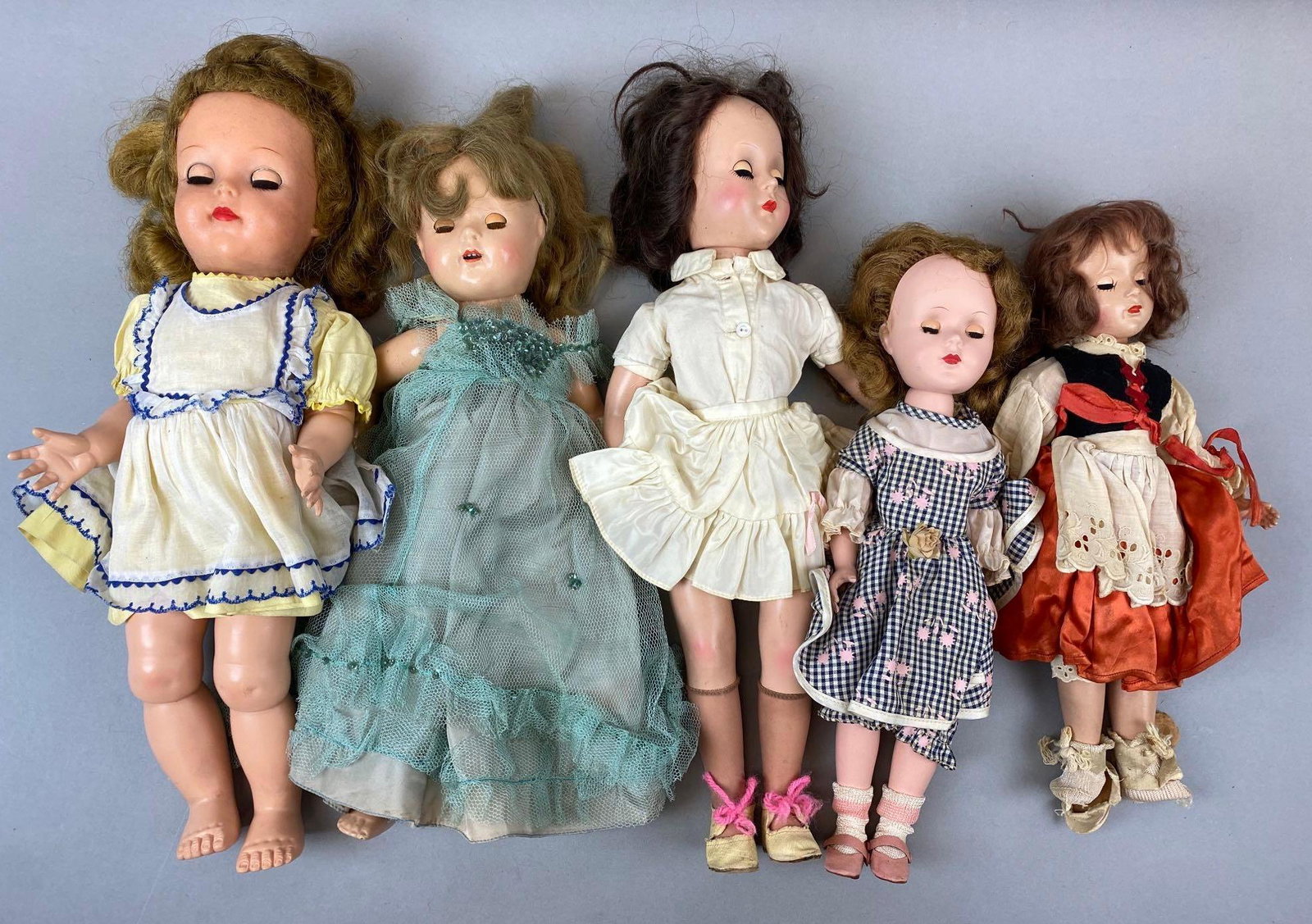 Group of 5 Assorted Sleepy Eyed Dolls: Largest measures 17 inches tall. One is marked IDEAL