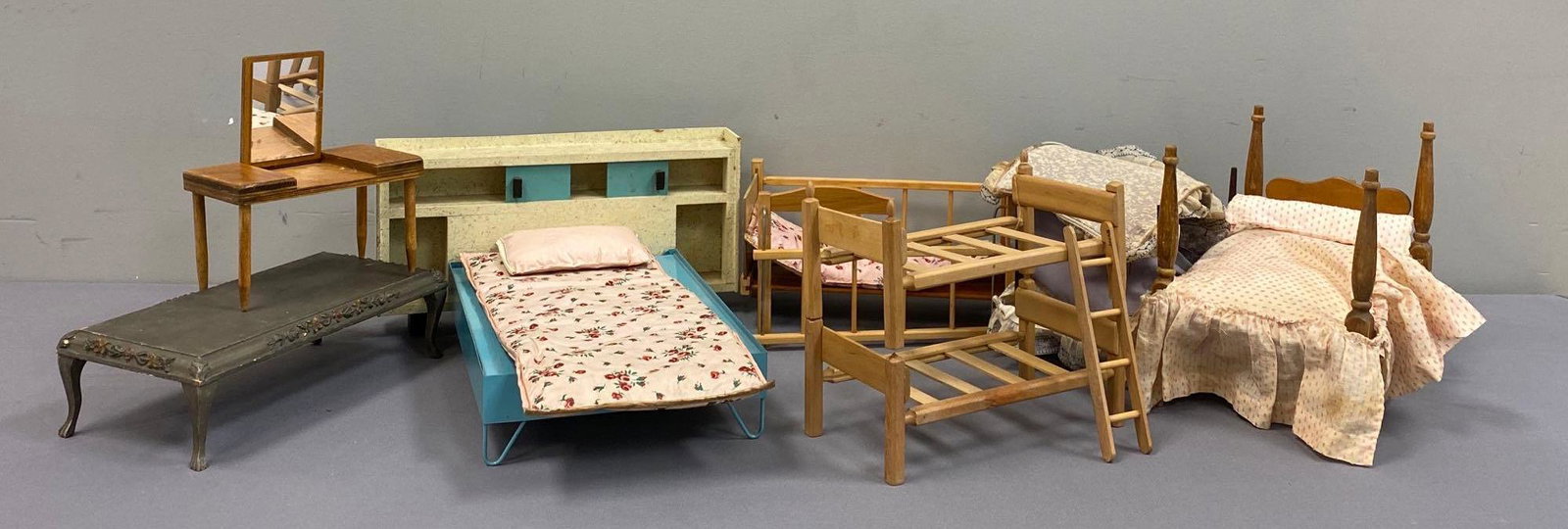 Group of 7 Doll Furniture Beds and More: Includes bunk beds, tables, crib, and more. Largest measures 7 1/2 x 16 x 14 inches. Some pieces missing
