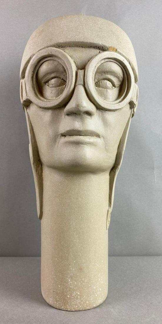Composite Pilot Statue Head: Parts chipped, measures 17 X 7 X 9 inches
