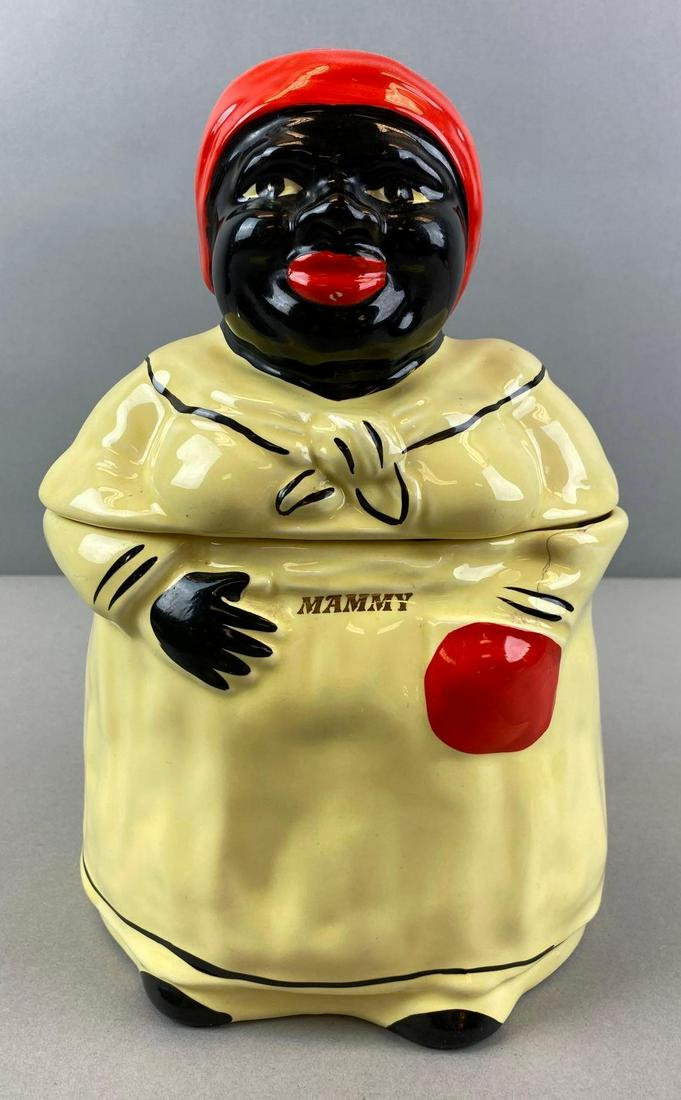 Pearl Black Americana Mammy Porcelain Pottery Cookie Jar: Makers mark on bottom. Small chip and crack. Largest measures 10 1/2 x 7 x 6 1/2 inches. Hand decorated with 22 KA Gold.